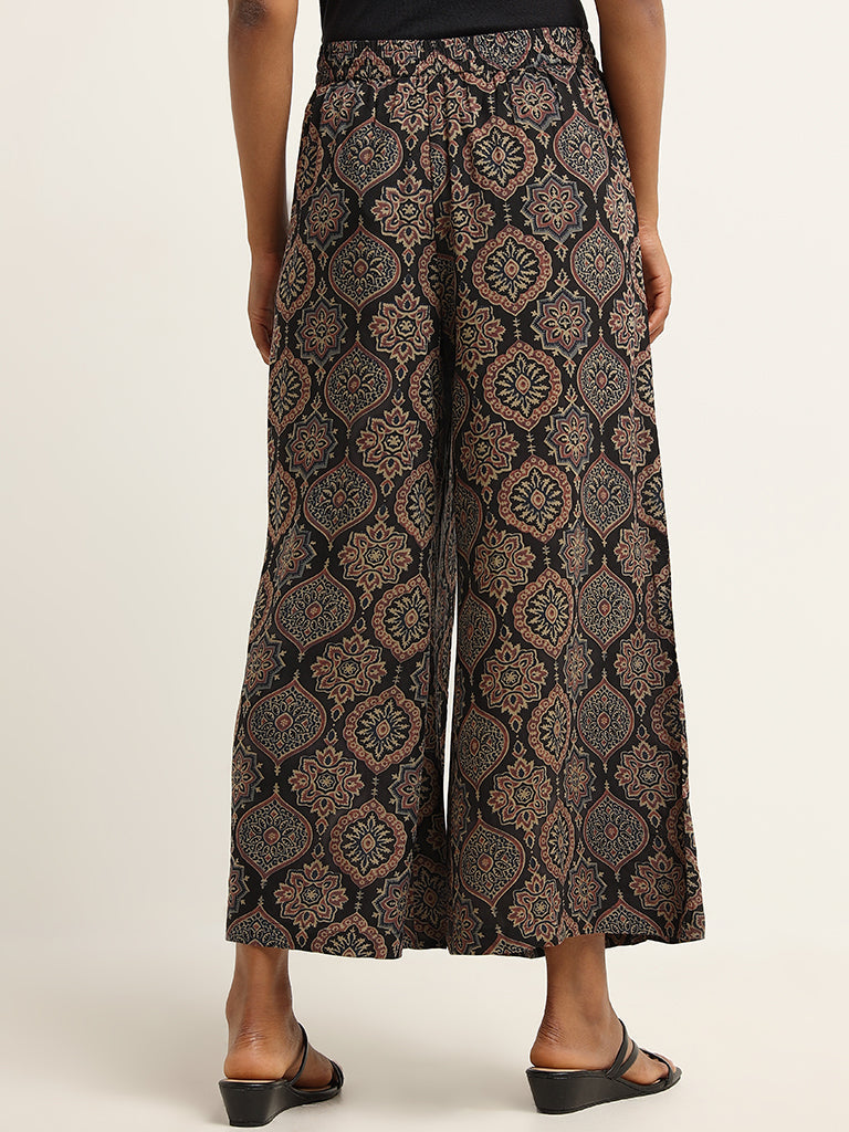 Utsa Black Printed Mid Rise Palazzos