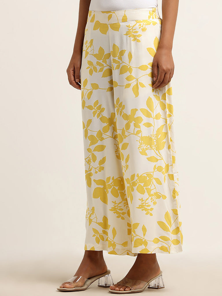 Utsa Yellow Leaf Printed Mid Rise Palazzos