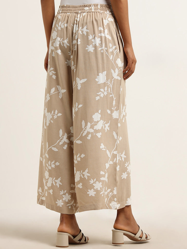 Utsa Beige Leaf Printed Mid Rise Palazzos