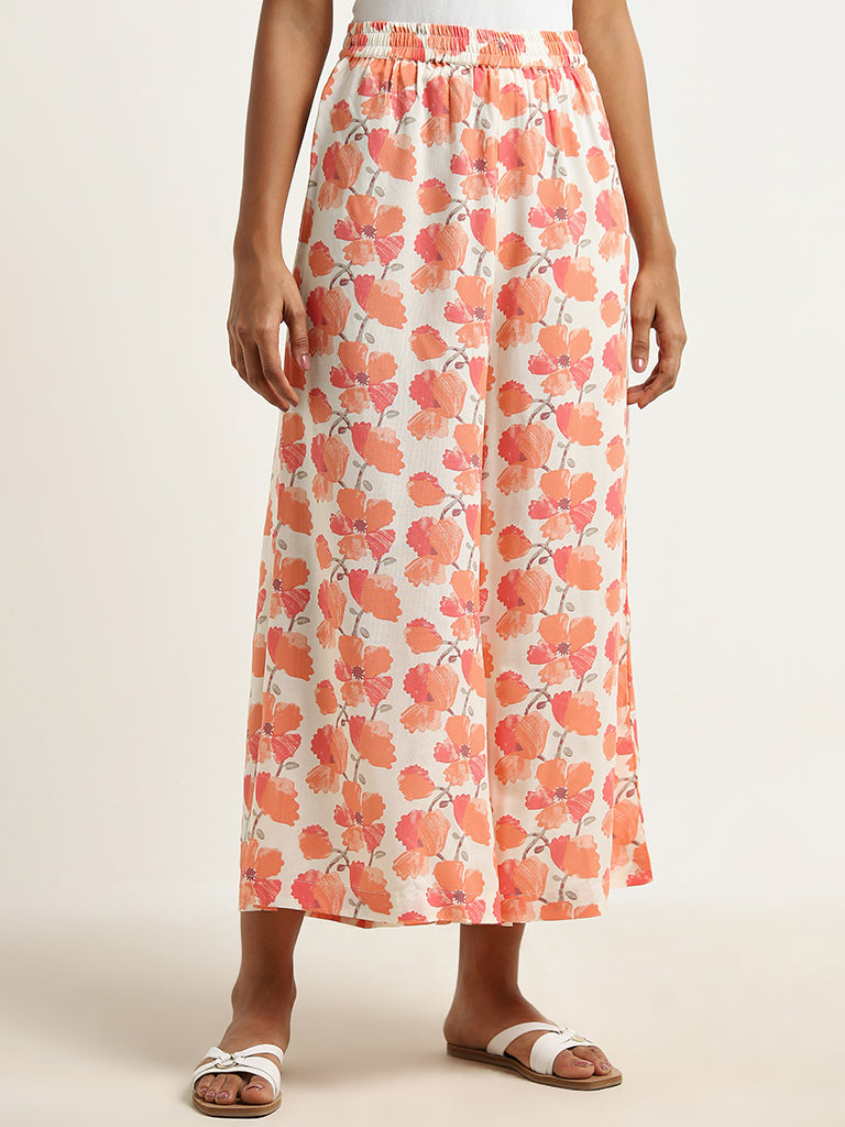 Utsa Orange Floral Printed Mid-Rise Palazzos