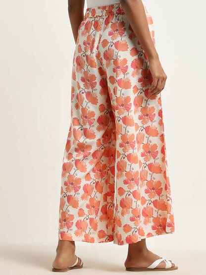 Utsa Orange Floral Printed Mid-Rise Palazzos