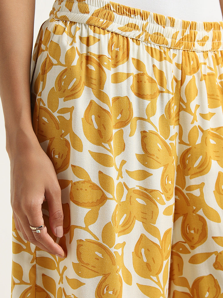 Utsa Yellow Floral Printed Mid-Rise Palazzos