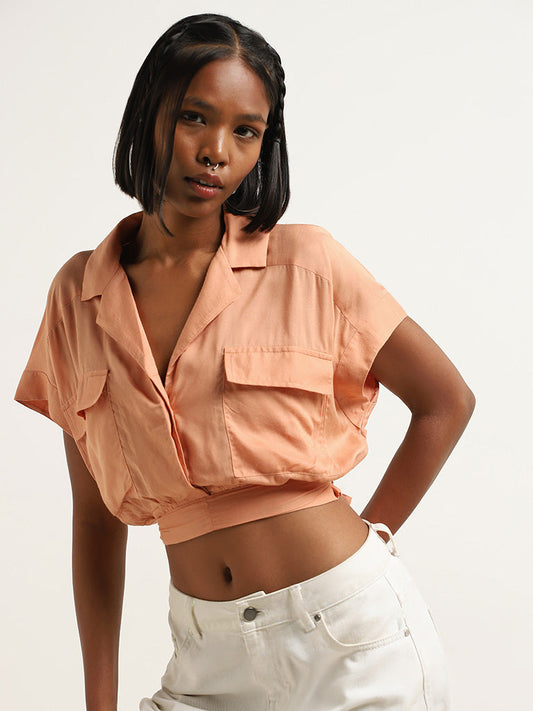 Nuon Light Orange Solid Crop Top with Belt