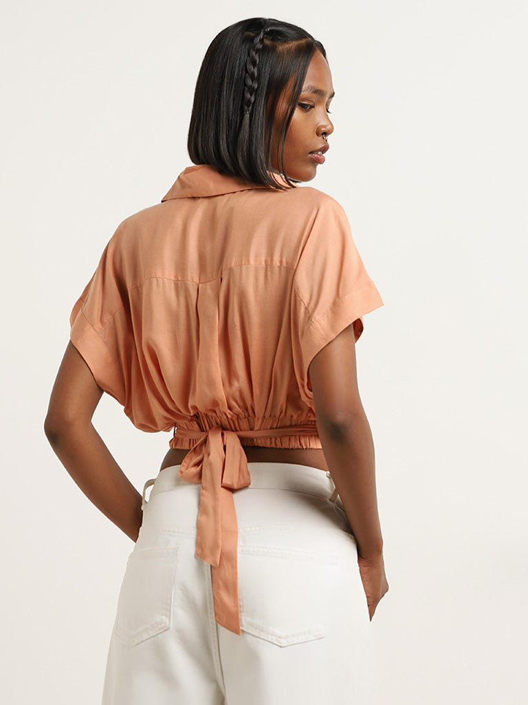 Nuon Light Orange Solid Crop Top with Belt