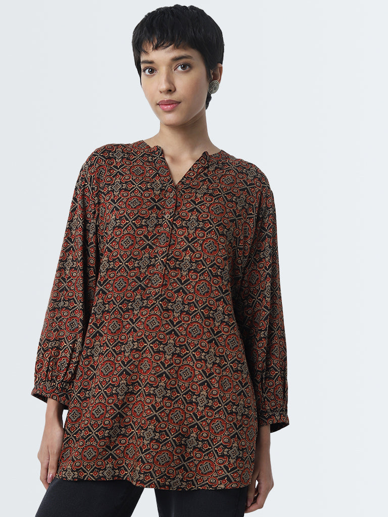 Utsa Maroon Abstract Printed Straight Kurti