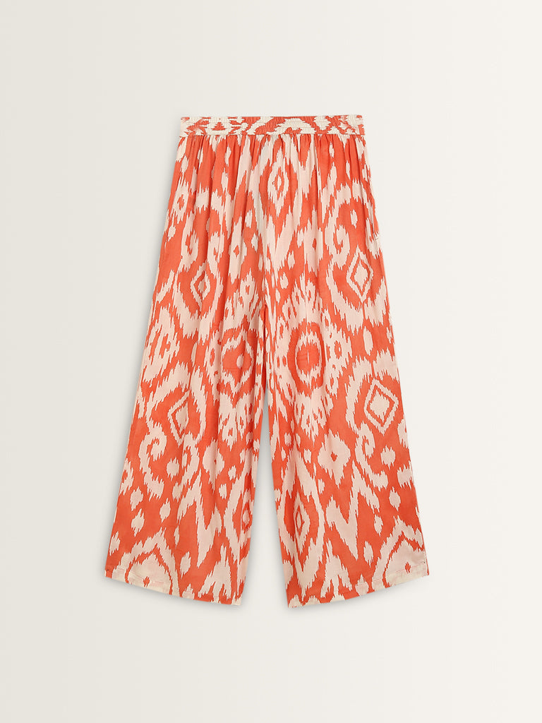 Utsa Orange Ikat Printed High-Rise Cotton Blend Palazzos