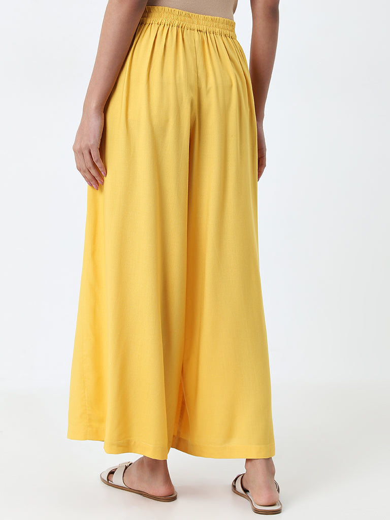 Utsa Yellow Solid High-Rise Palazzos