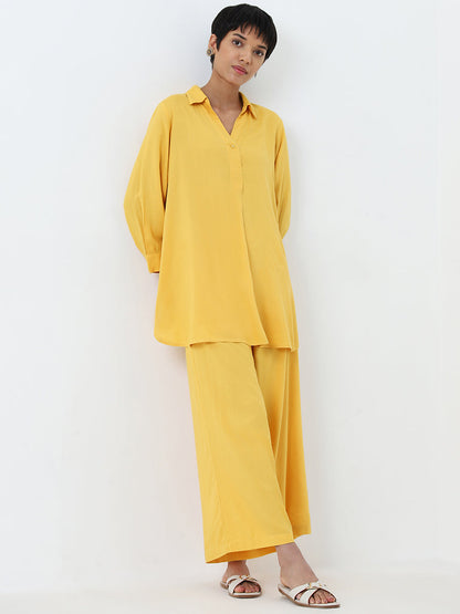 Utsa Yellow Solid High-Rise Palazzos