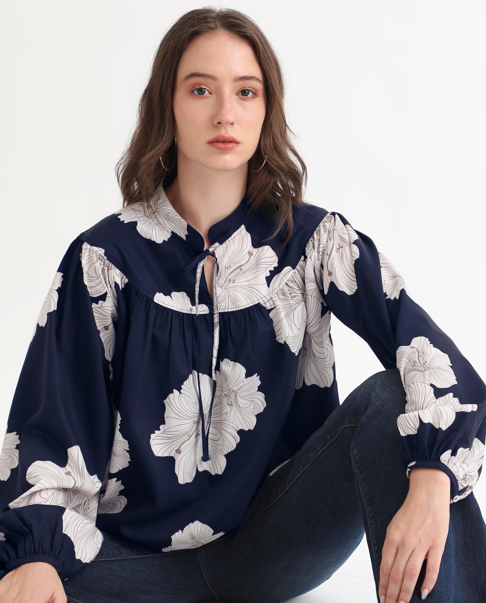 Rareism Women Azure Dark Navy Polyester Fabric Full Sleeves Tie-Up Closure High Neck Bishop Sleeve Relaxed Fit Floral Print Top