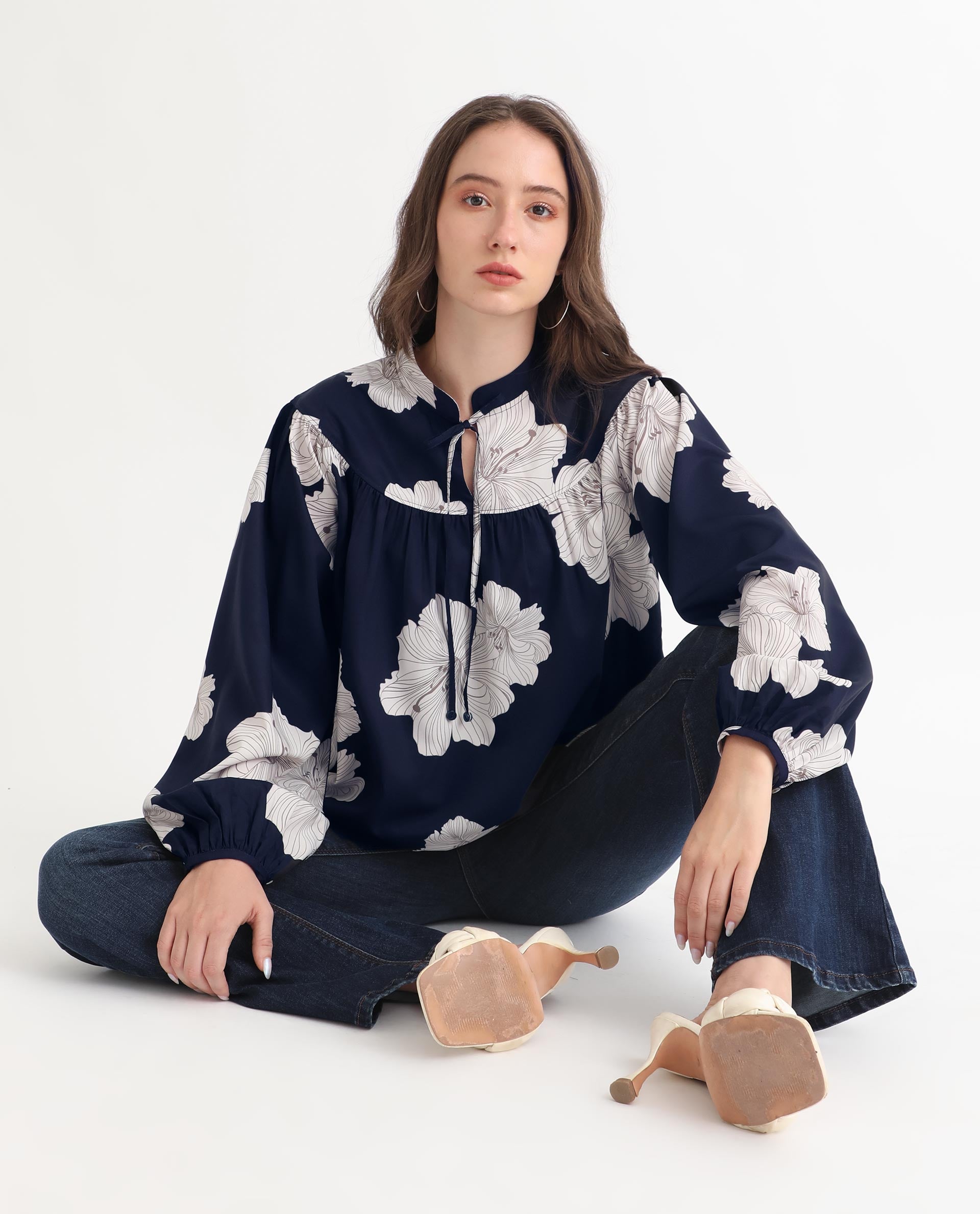 Rareism Women Azure Dark Navy Polyester Fabric Full Sleeves Tie-Up Closure High Neck Bishop Sleeve Relaxed Fit Floral Print Top