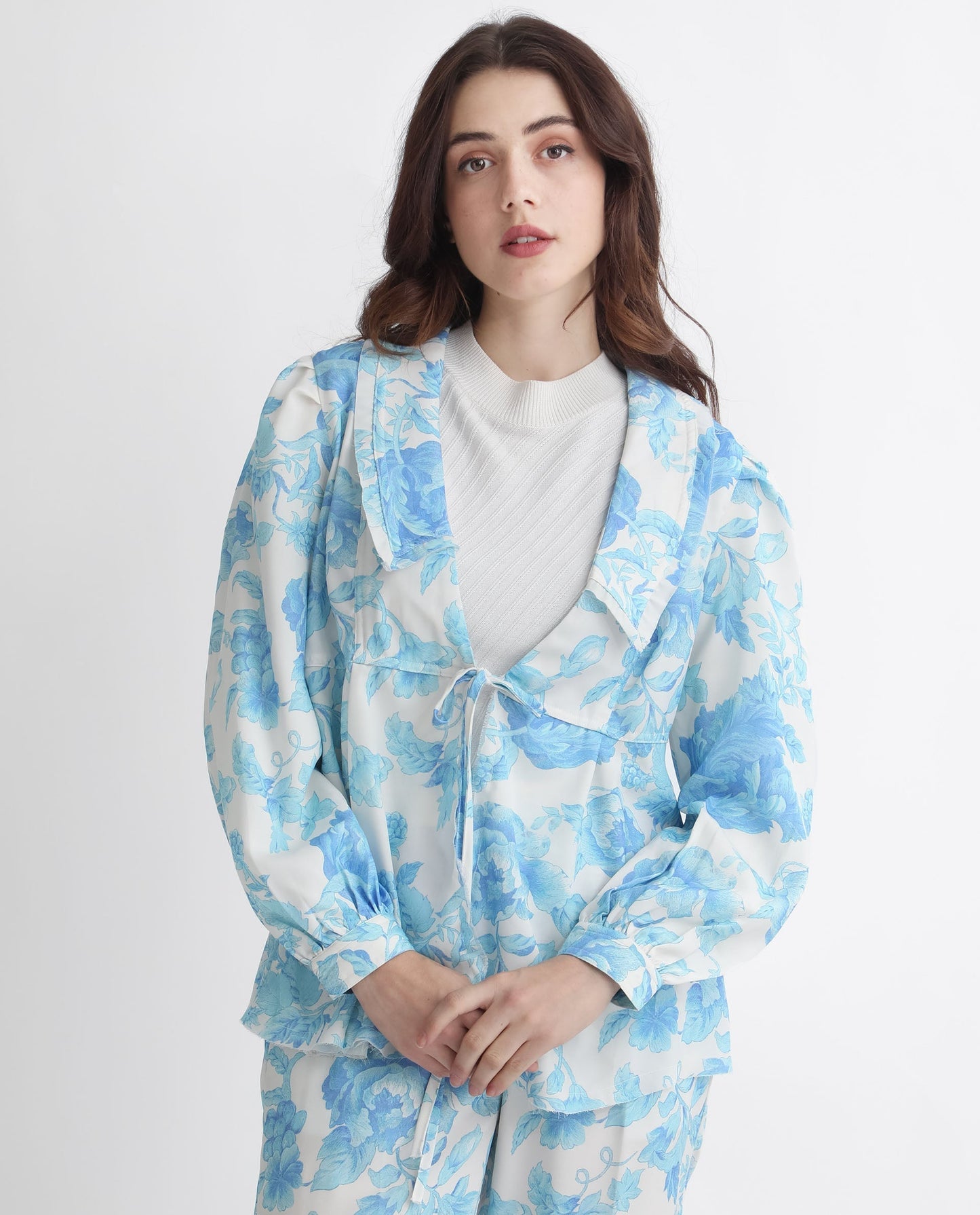 Rareism Women Enstar Light Blue Polyester Fabric Full Sleeves Tie-Up Closure V-Neck Balloon Sleeve Relaxed Fit Floral Print Top