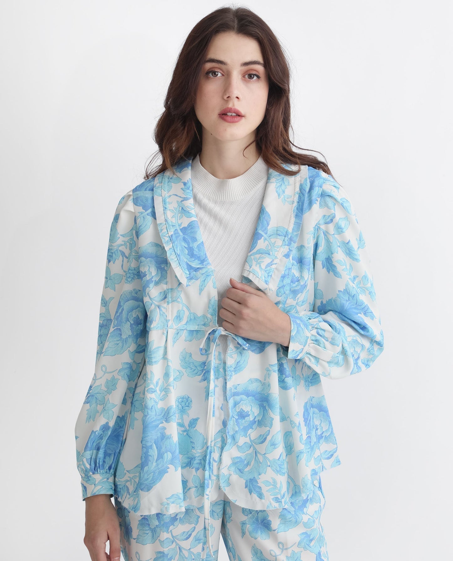 Rareism Women Enstar Light Blue Polyester Fabric Full Sleeves Tie-Up Closure V-Neck Balloon Sleeve Relaxed Fit Floral Print Top