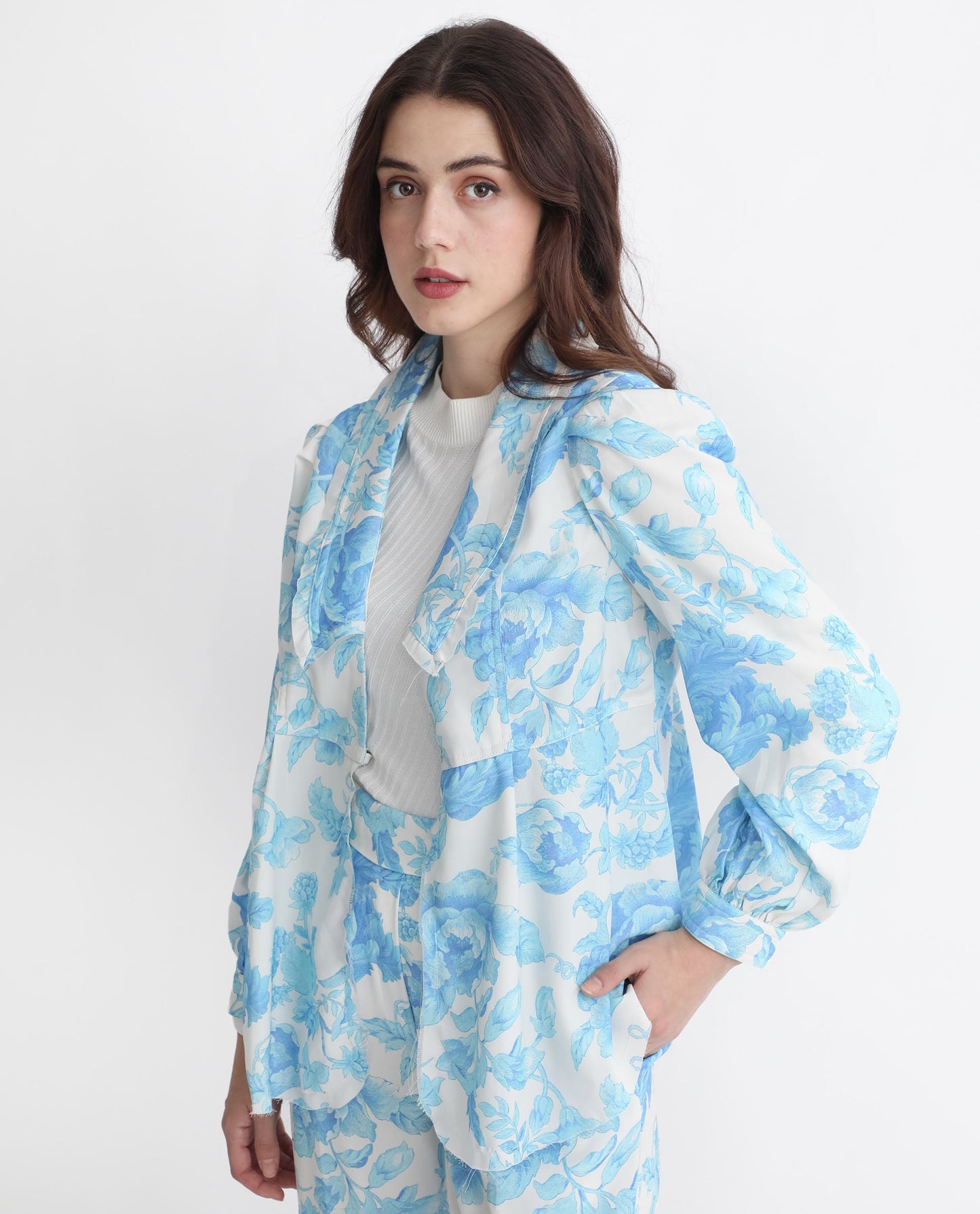 Rareism Women Enstar Light Blue Polyester Fabric Full Sleeves Tie-Up Closure V-Neck Balloon Sleeve Relaxed Fit Floral Print Top