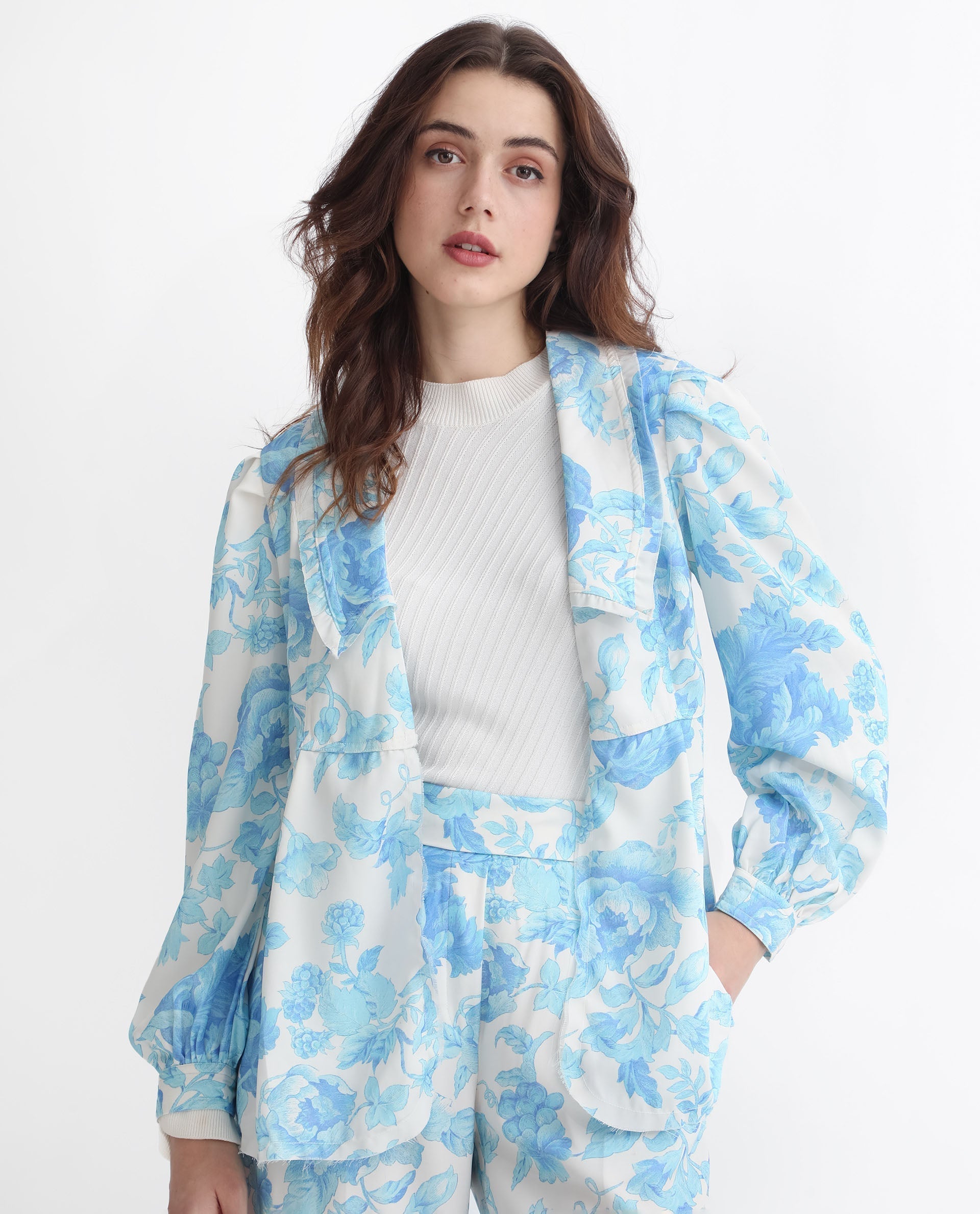 Rareism Women Enstar Light Blue Polyester Fabric Full Sleeves Tie-Up Closure V-Neck Balloon Sleeve Relaxed Fit Floral Print Top