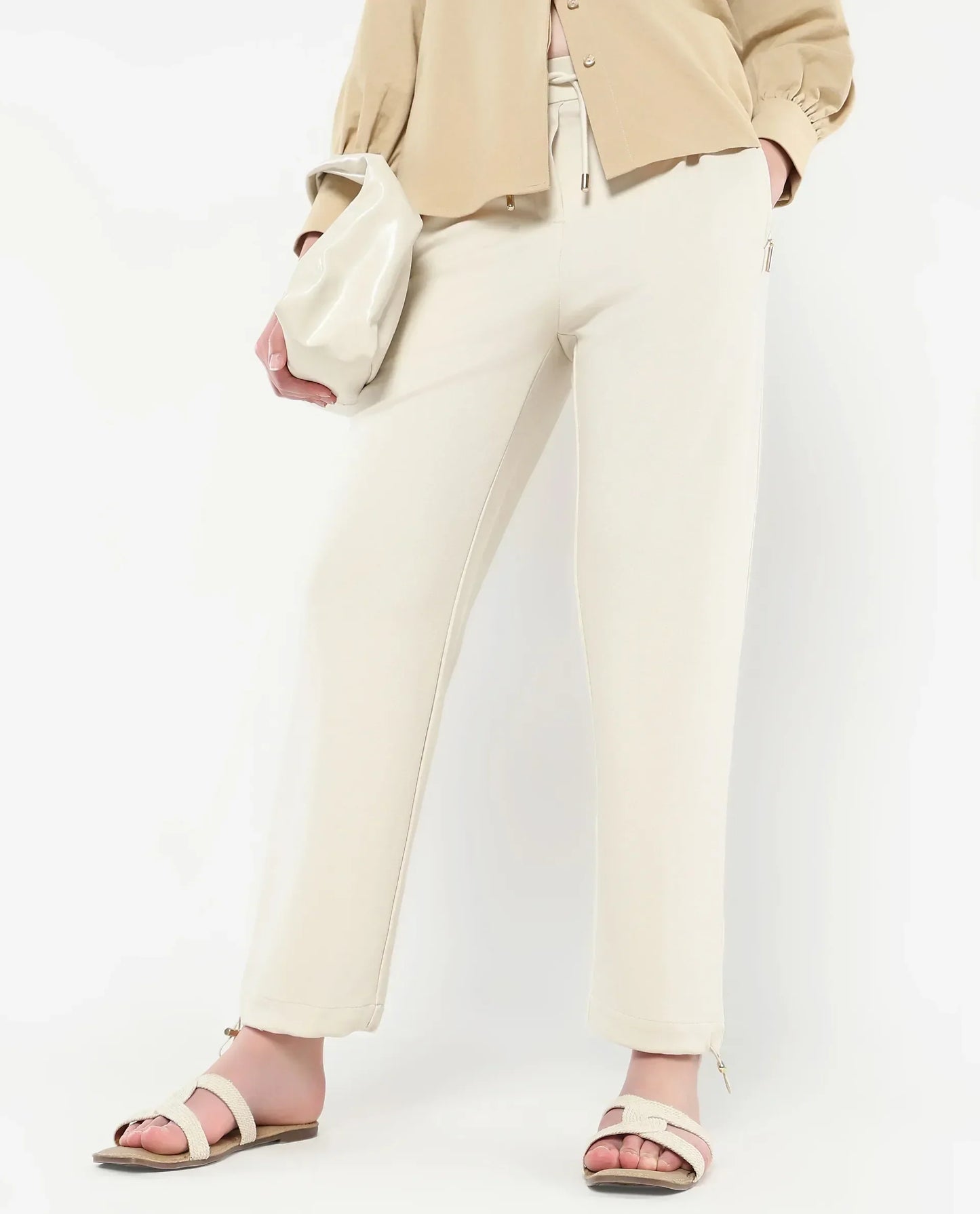 Rareism Women Gumushane Off White Modal Lycra Fabric Straight Fit Ankle Length Plain Track Pant