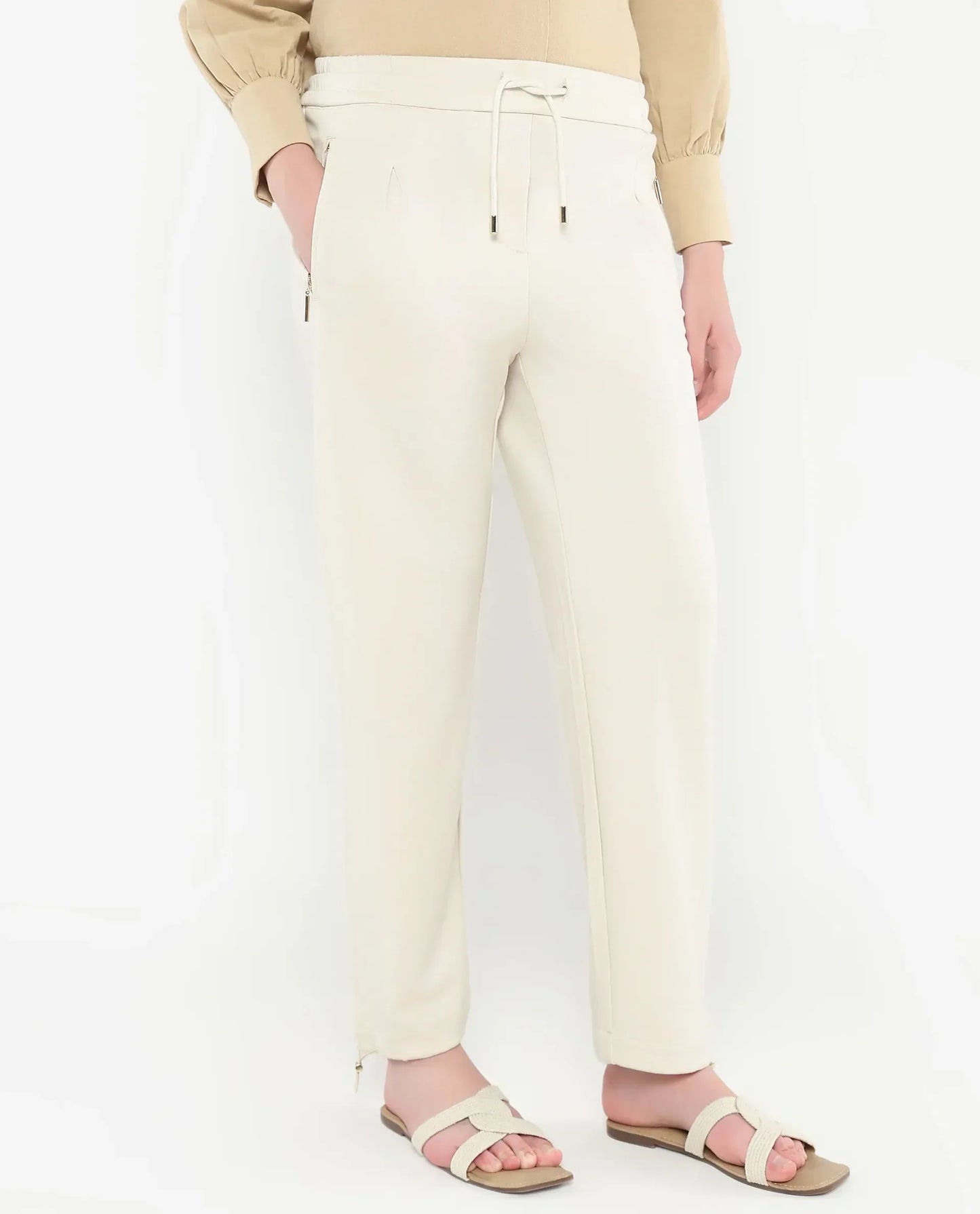 Rareism Women Gumushane Off White Modal Lycra Fabric Straight Fit Ankle Length Plain Track Pant