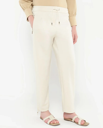 Rareism Women Gumushane Off White Modal Lycra Fabric Straight Fit Ankle Length Plain Track Pant