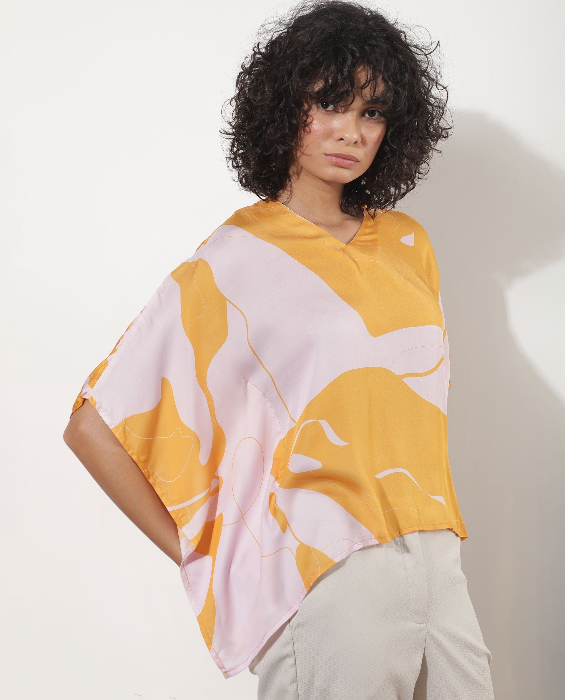 Rareism Women Alyse Mustard Modal Fabric Short Sleeves V-Neck Regular Fit Abstract Print Top