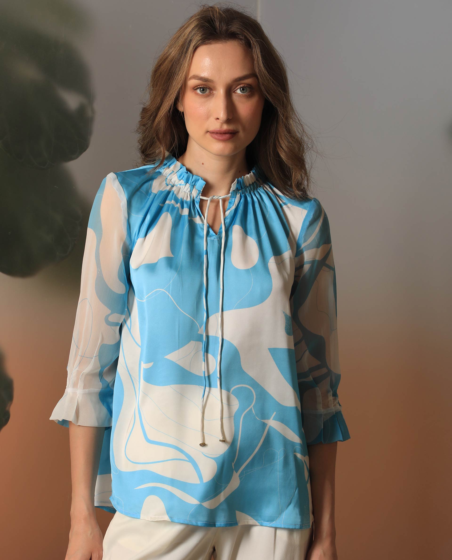 Rareism Women Meara Blue Polyester Fabric 3/4Th Sleeves Tie-Up Neck Ruffled Sleeves Regular Fit Abstract Print Top