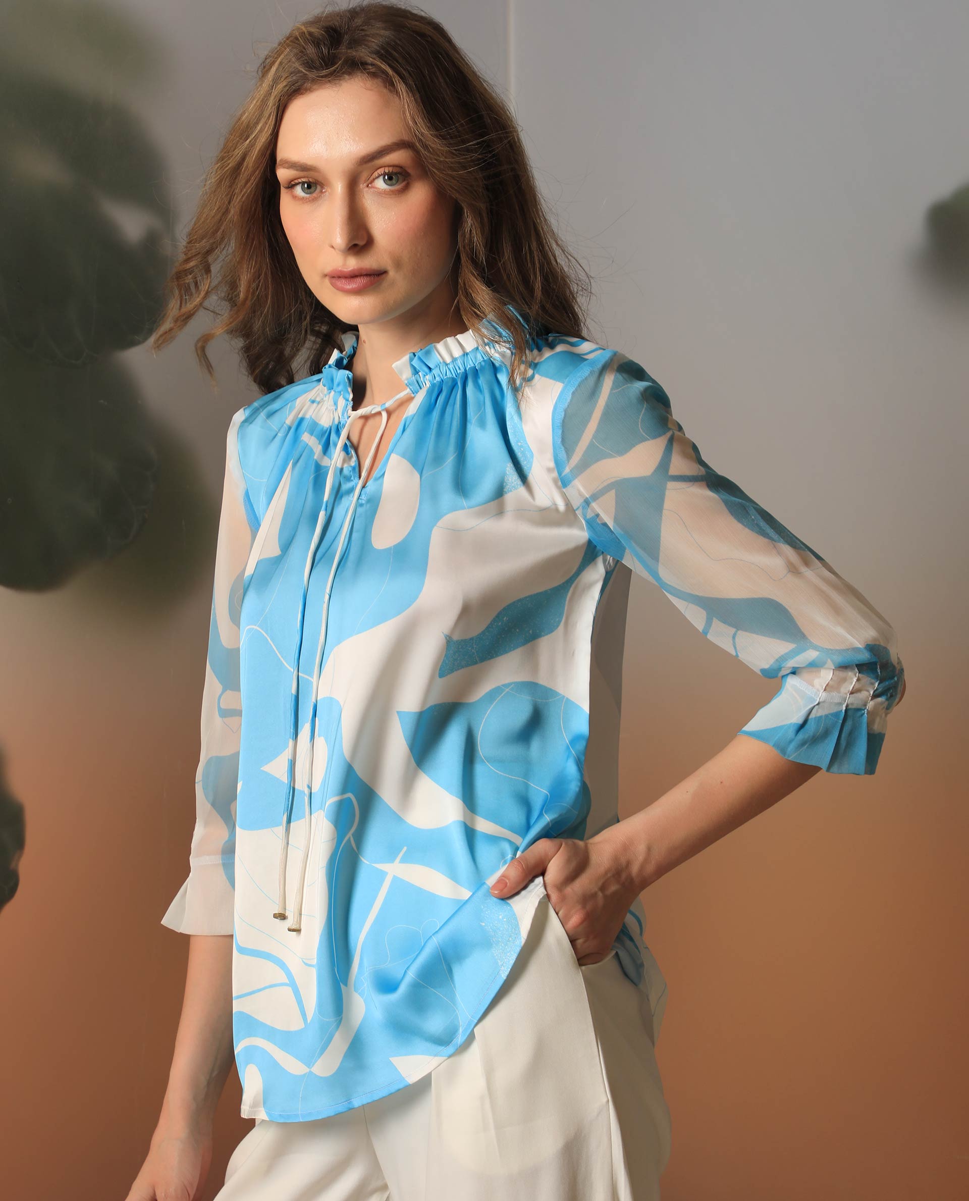 Rareism Women Meara Blue Polyester Fabric 3/4Th Sleeves Tie-Up Neck Ruffled Sleeves Regular Fit Abstract Print Top