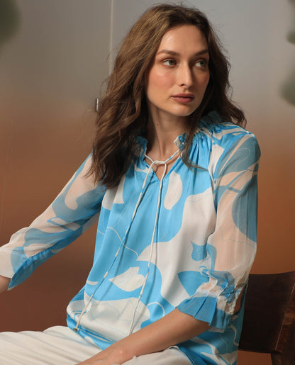 Rareism Women Meara Blue Polyester Fabric 3/4Th Sleeves Tie-Up Neck Ruffled Sleeves Regular Fit Abstract Print Top